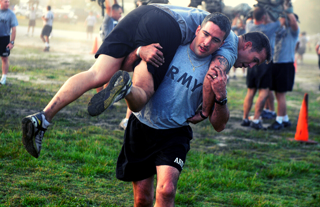 Army members doing team workouts