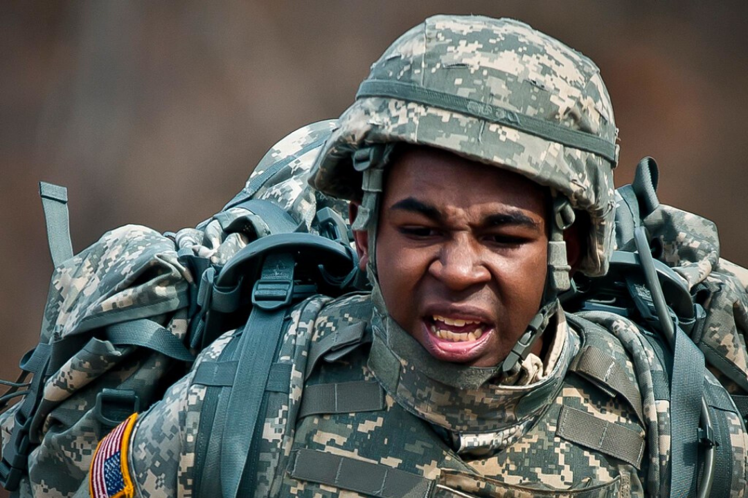 military member enduring pain during physical training