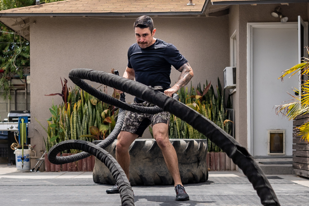 HIIT training with battle ropes