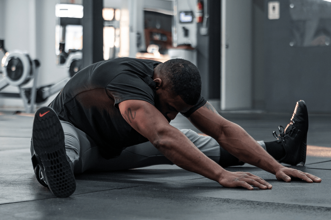 someone completing a warmup for a workout